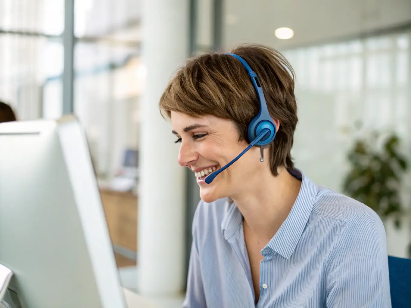 A friendly customer service representative assisting a client over the phone, showcasing Trust Clean Cares' commitment to customer support.